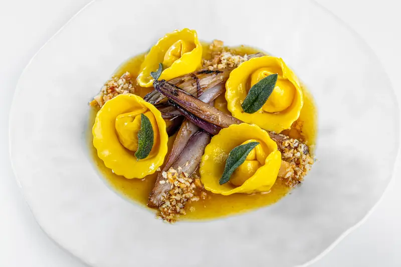 Golden filled pasta with sage leaves, roasted shallots and a toasted crumb by myCHEF Cape Town